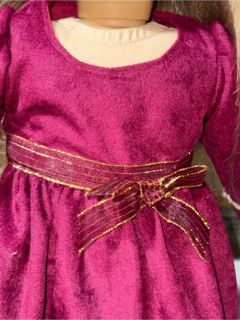 18” doll maroon Velvet dress with gold bow sash around waist